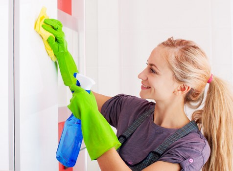 Carpet cleaning team preparing a safe work area