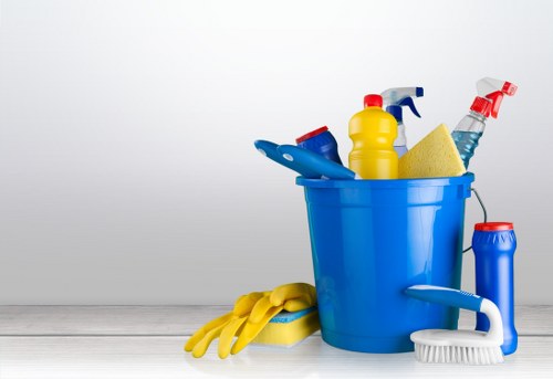 Cleaner preparing equipment and PPE before a carpet cleaning job