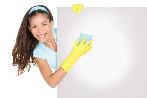 Local carpet cleaning service preparing a room for treatment