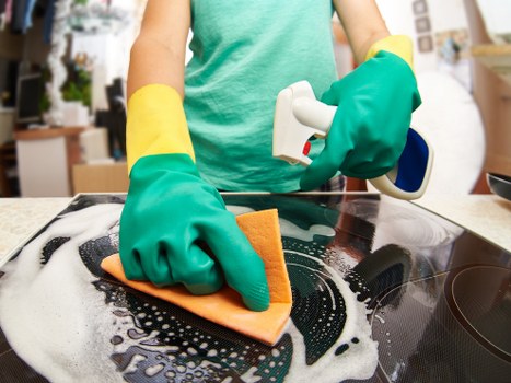 Cleaner working on office carpets in the SW8 area